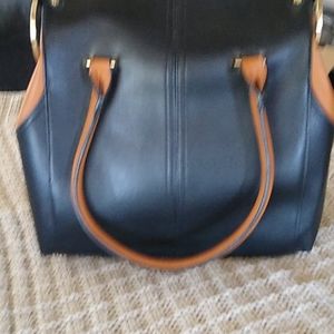 Beautiful large black and tan purse.